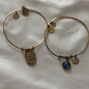 Alex and Ani Gold Bracelets with Blue Charm